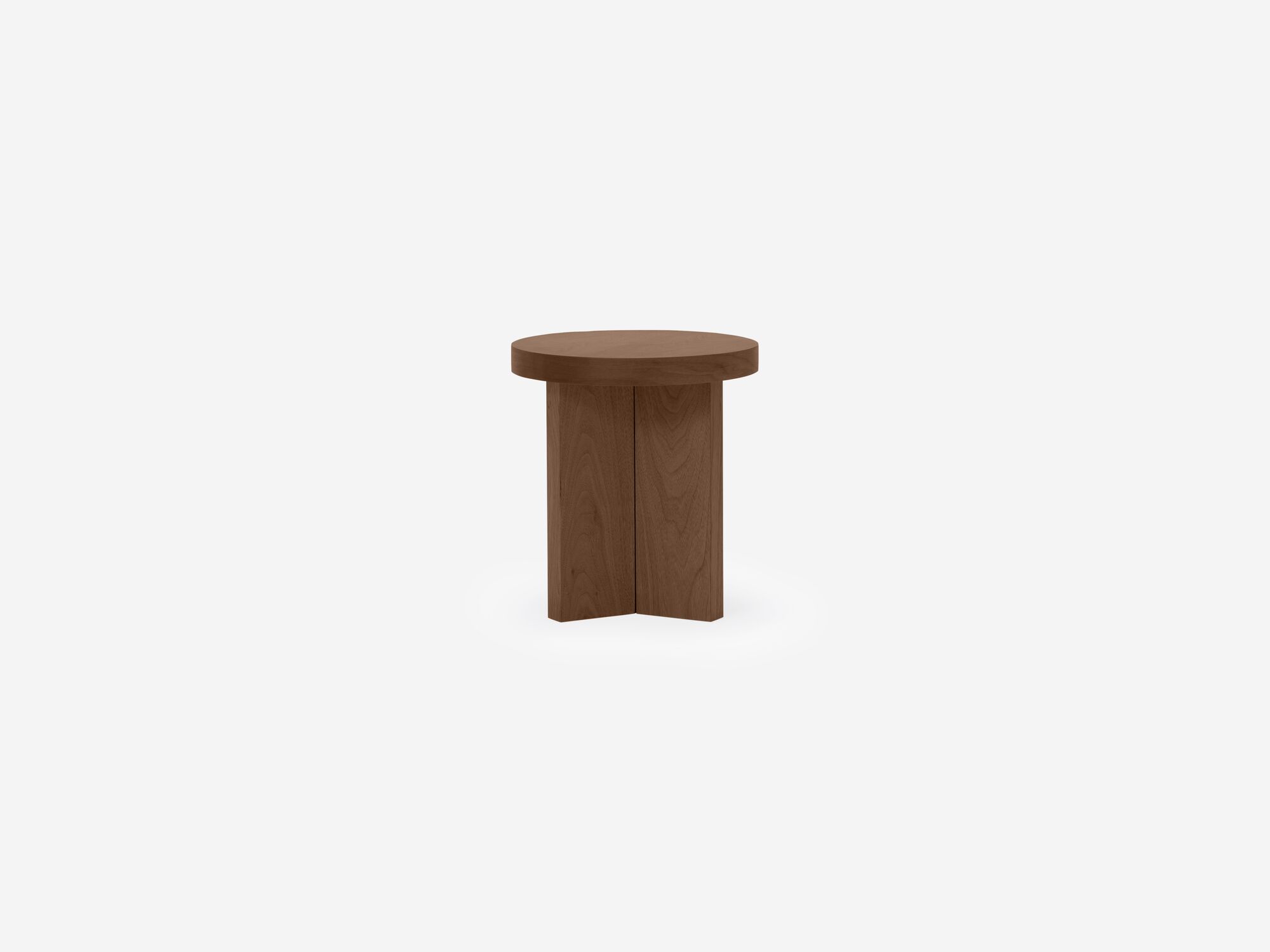 Front view of small round walnut end table